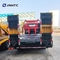 HOWO 破片トラック 4x2 5トンの掘削機 積載機 積載 トロー 破片トラック フラットベッド貨物トラック