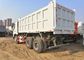 負荷白いHowo 6x4のダンプカー トラック3の車軸ダンプ トラックの頑丈な30トンの
