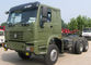 ZZ2167M5227 6x6の廃物のコンパクターのトラックはすべての車輪ドライブ貨物SINOTRUCKのユーロII III 380hp力をトラックで運びます